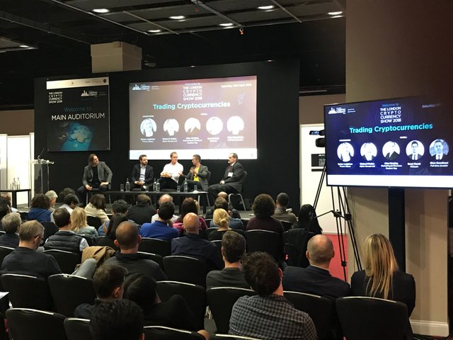 trading cryptocurrencies - anarcotech main stage at the london cryptocurrency show 2018.jpg