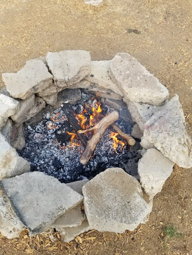 Build up a pit of white coals.jpg