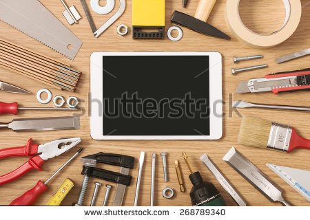 stock-photo-digital-touch-screen-banner-with-diy-and-work-tools-all-around-on-a-wooden-table-top-view-268789340.jpg