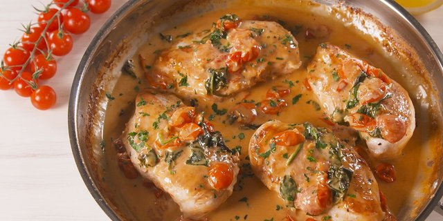 delish-creamy-tuscan-chicken-still001-1-1522779212.jpg