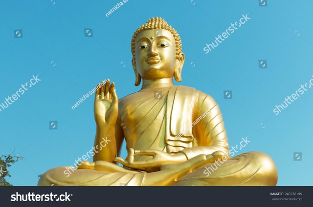 stock-photo-image-of-buddha-with-blue-sky-background-249736195.jpg
