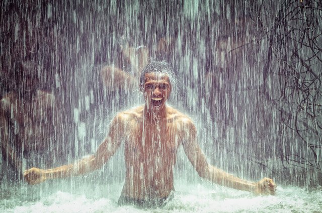 man-under-waterfall-2150164_1920.jpg