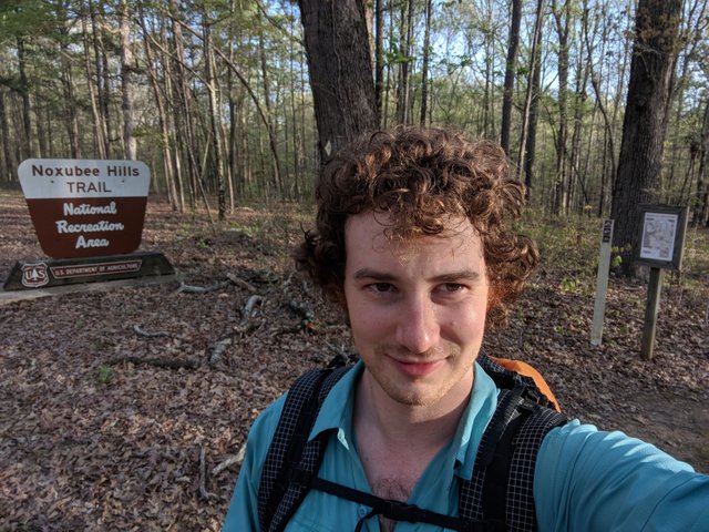 selfie in front of the Nuxobee Hills southern trailhead