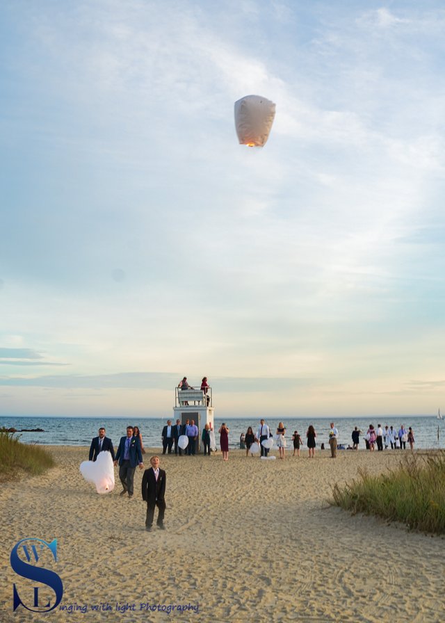 Gulf Beach wedding party and lanterns.jpg