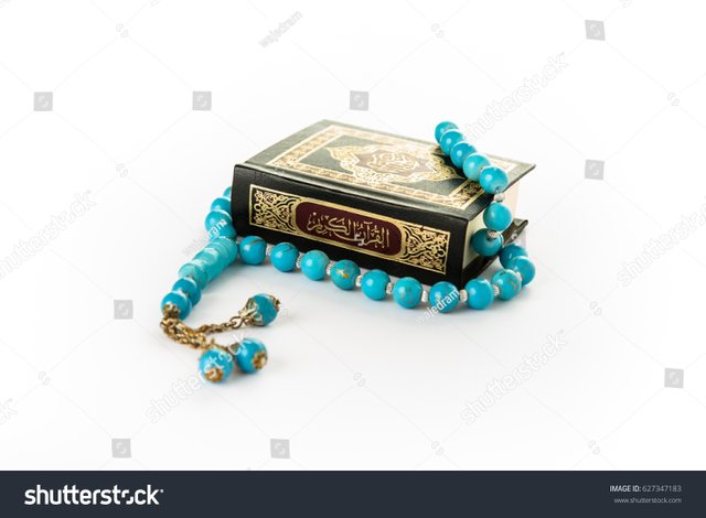 stock-photo-quran-with-rosary-holy-book-of-muslims-koran-quran-white-backgr.jpg