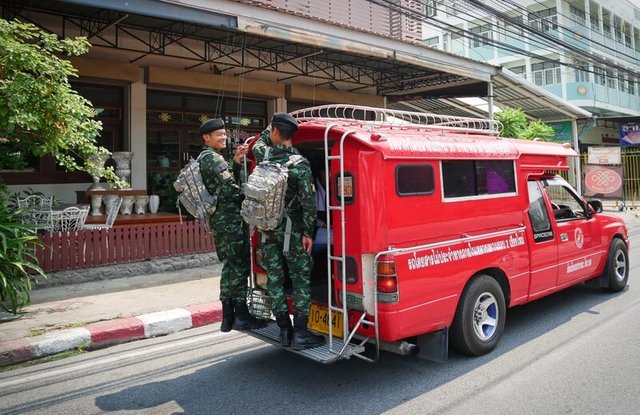 happy army guys on songthaew.jpg