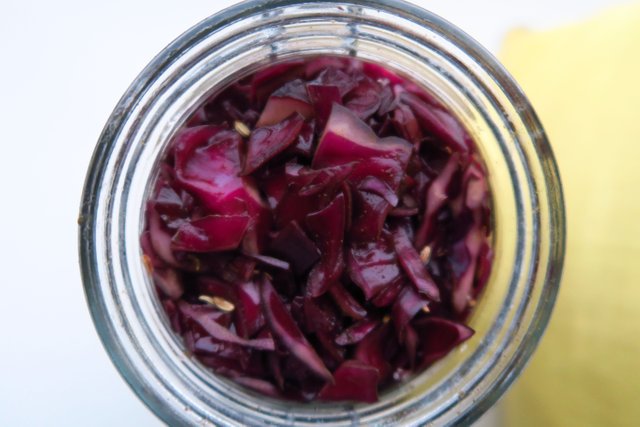 red cabbage packed in jar, ready for fermentation.JPG