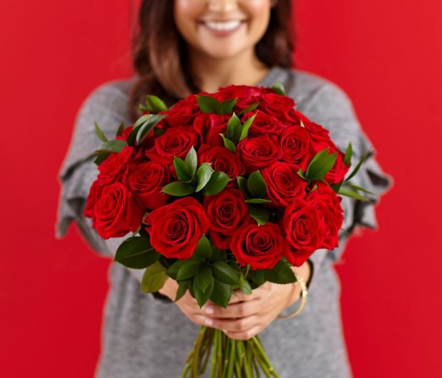 woman-with-roses-768x656.jpg