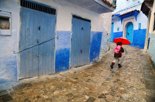 Chefchaouen-Child-with-Red-Umbrella-SMALL-1024x678.jpg