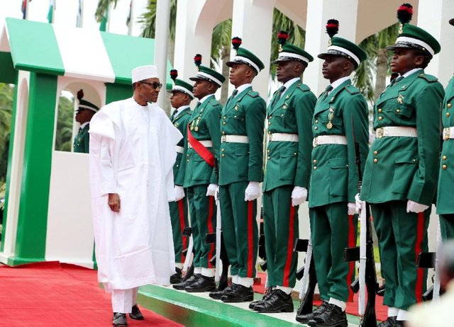 Buhari-.-PMB-inspects-guard-of-honour-in-Aso-Rock-during-Oct-1-2015-anniversary.jpg