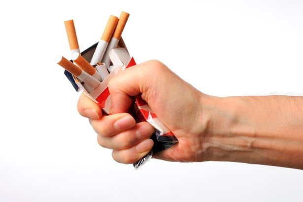 Isolated-shot-of-broken-cigarettes-on-white-background.jpg