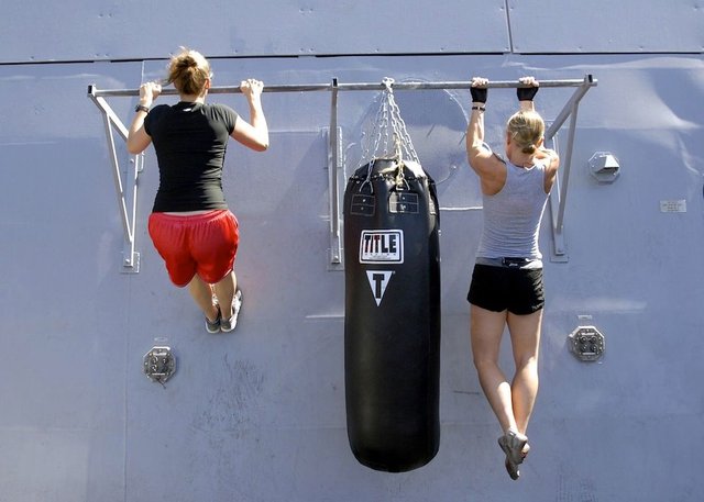 Women doing pullups.jpg