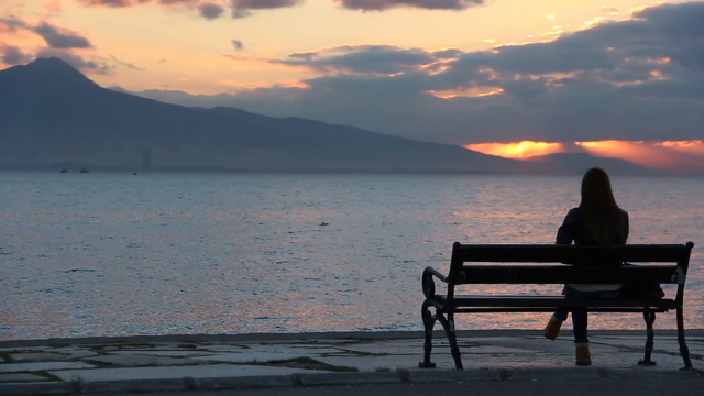 lonely-girl-sitting-on-bench-at-sunset_spvmosa8__F0000.png