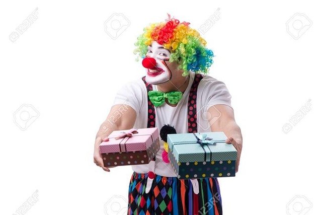 83963724-funny-clown-with-a-gift-present-box-isolated-on-white-background-Stock-Photo.jpg