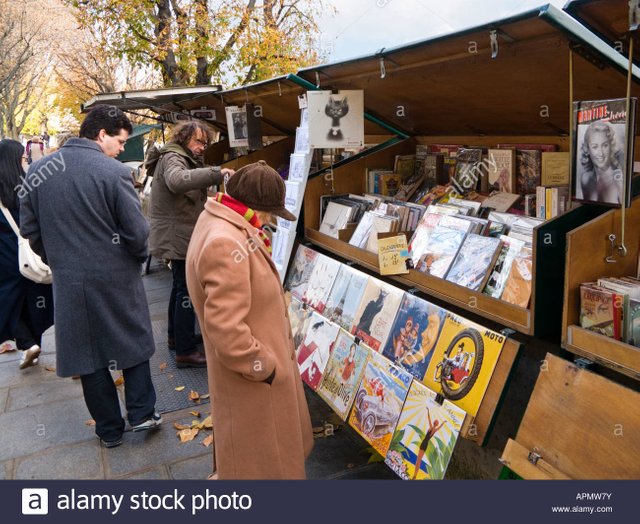 one-of-the-open-air-stalls-selling-art-and-books-on-the-left-bank-APMW7Y.jpg