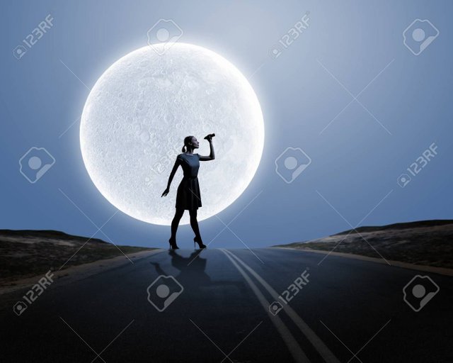 30230882-silhouette-of-woman-looking-in-binoculars-with-big-full-moon-at-background.jpg