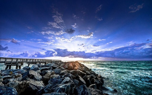ocean-sea-wave-rock-shore-sky-sun-pier.jpg