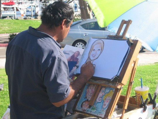 caricature-artist-at-work-on-a-sunny-san-diego-day-e1391306204726.jpg