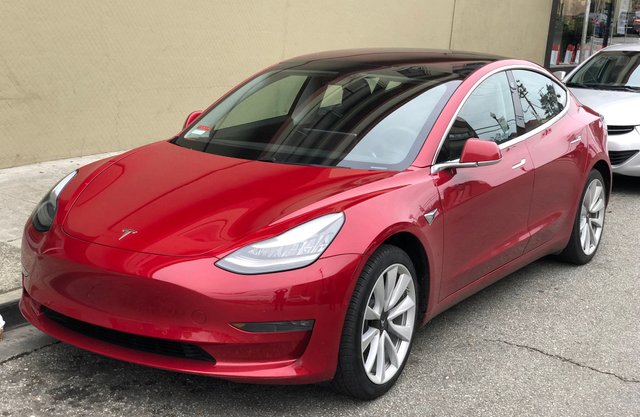 Tesla_Model_3_parked,_front_driver_side.jpg