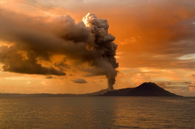 orange-sky-volcano-still-water.jpg