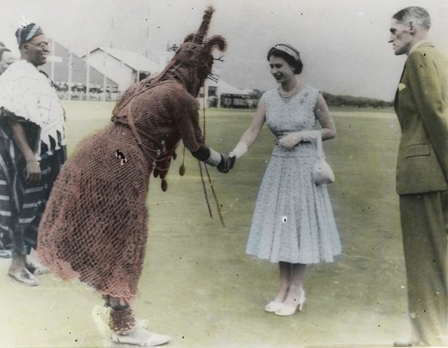 A-photo-by-Chief-S.O.-Alonge-showing-Oba-Akenzua-II-of-Benin-greeting-Queen-Elizabeth-II.jpg