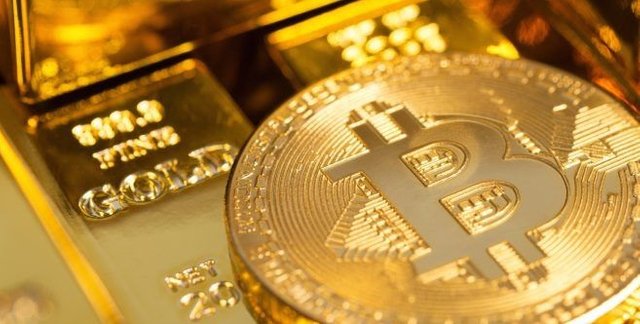 thumb_Bitcoin_and_goldbars1-e1518131162227-1024x376_1024.jpg