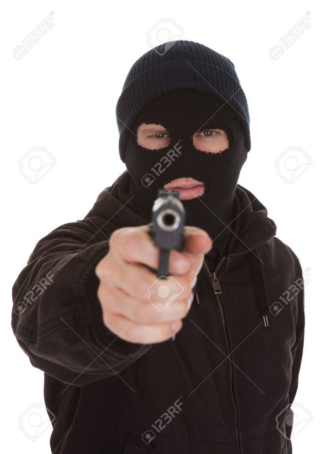 20984173-Burglar-Wearing-Mask-Aiming-Gun-Towards-Camera-Stock-Photo.jpg