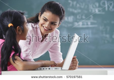 stock-photo-teacher-and-girl-at-laptop-horizontal-570197581.jpg