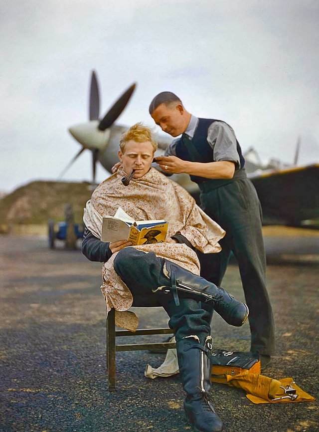 RAF pilot getting a haircut during a break between missions, 1942.jpg