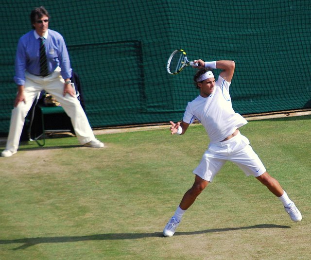 Rafael_Nadal_2011_Wimbledon_forehand_trim.jpg