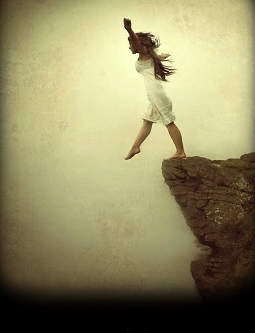 woman-on-cliffs-edge.jpg