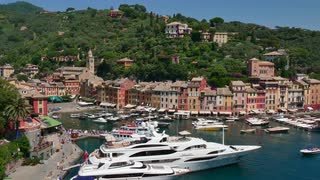 view-of-portofino-in-liguria-italy-beautiful-and-famous-mediterranean-sea-town-in-the-italian-riviera-travel-tourist-destination-landscape-luxury-yachts-in-harbor-boats-in-port_hwo9sicr__S0004.jpg