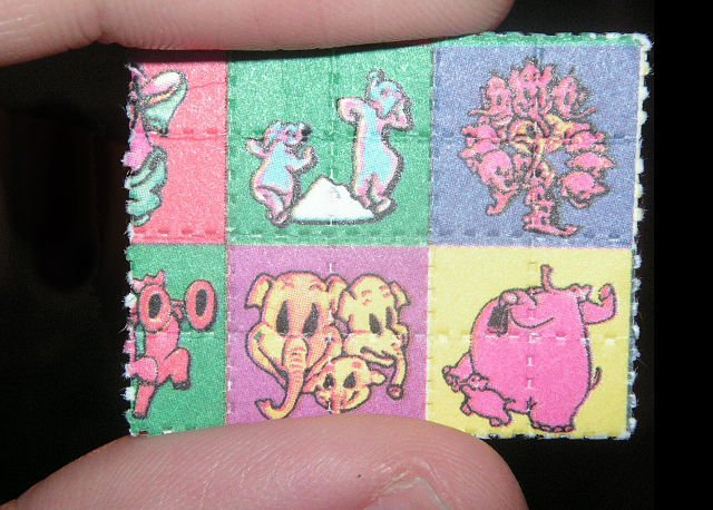 640px-Pink_Elephants_on_Parade_Blotter_LSD.jpg