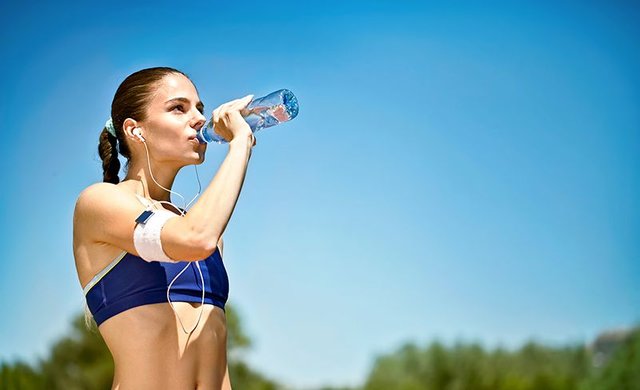 fit-woman-drinking-water.jpg