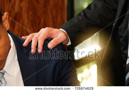 stock-photo-businessmen-encourage-businessman-smashing-shoulders-encouraging-colleagues-close-up-of-male-726674629.jpg
