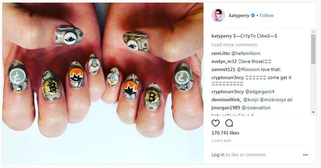 Katy Perry nails done with cryptocurrency symbols 2018-01-26.jpg