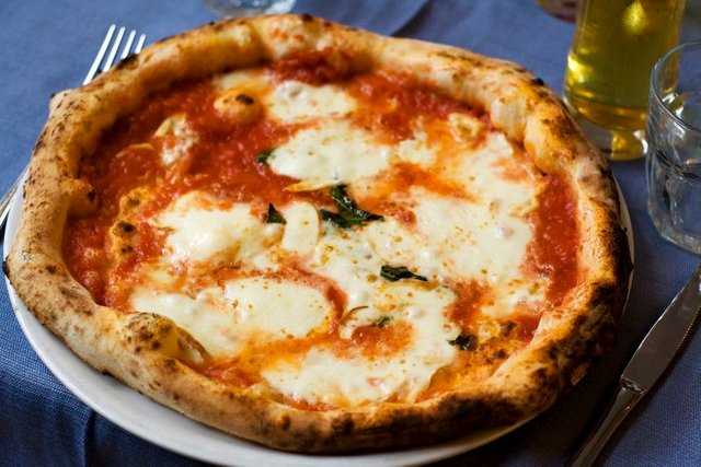 authentic-neapolitan-margherita-pizza-157507884-582612543df78c6f6acb5a8a.jpg