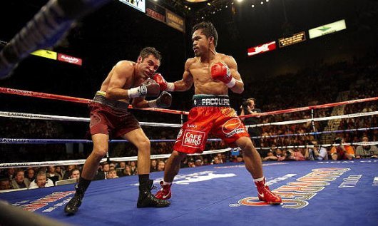 Manny_Pacquiao_vs_Oscar_De_La_Hoya_sharp1-530x317.jpg