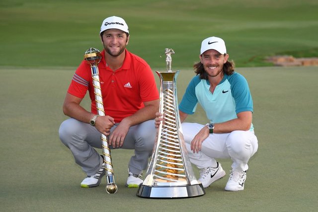 jon-rahm-tommy-fleetwood-race-to-dubai-2017-sunday-trophies.jpg