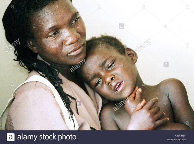 a-mother-holds-her-sick-child-in-her-arms-CRPYRT.jpg