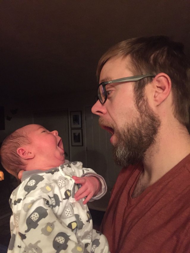 Bishop making faces with Dad.JPG