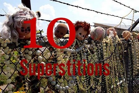 baby-doll-heads-stuck-on-a-fence.jpg