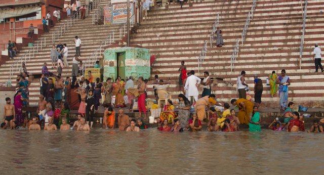 People taking bath and doing prayers in the Holy Ganga