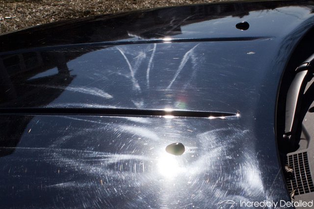 Swirls-And-Scratches-Black-Nissan-Hood-5-Holograms.jpg