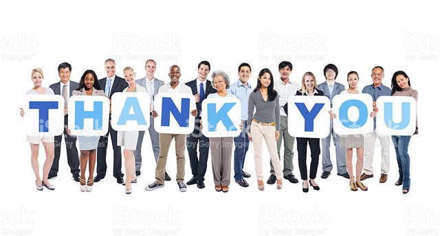group-of-business-people-holding-placards-forming-thank-you-picture-id493283243.jpg