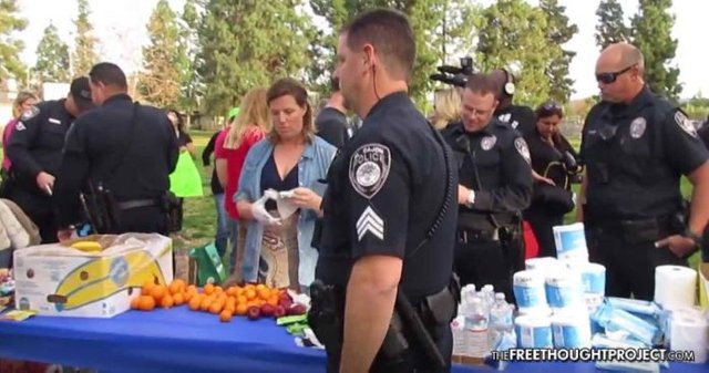 arrested-feeding-homeless-696x366.jpg