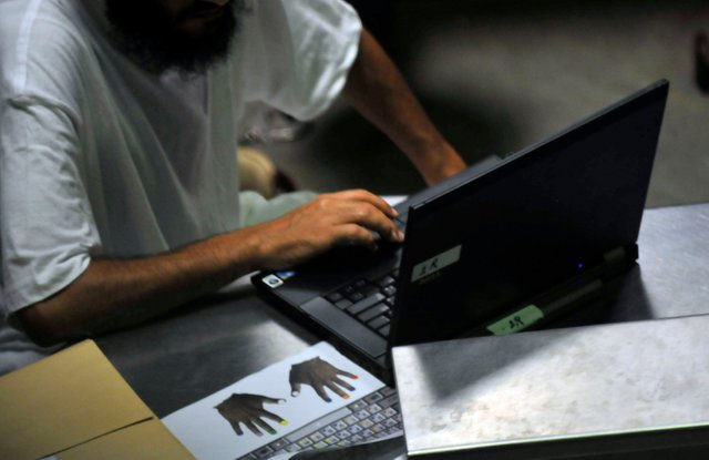 US_Navy_101020-N-3887D-086_A_detainee_learns_typing_skills_during_a_life_skills_class_in_Camp_Six_at_Joint_Task_Force_Guantanamo.jpg