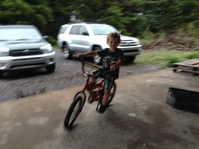 4 year old riding bike without training wheels