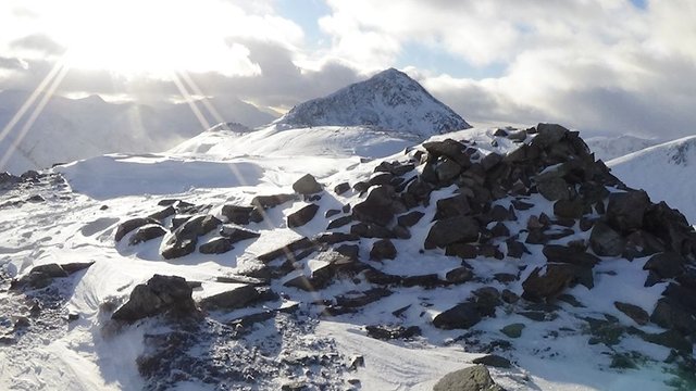 55 Looking back along ridge, with sunbeams.jpg