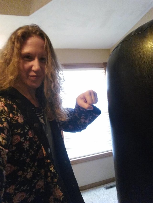 takingitoutonthepunchingbag.jpg